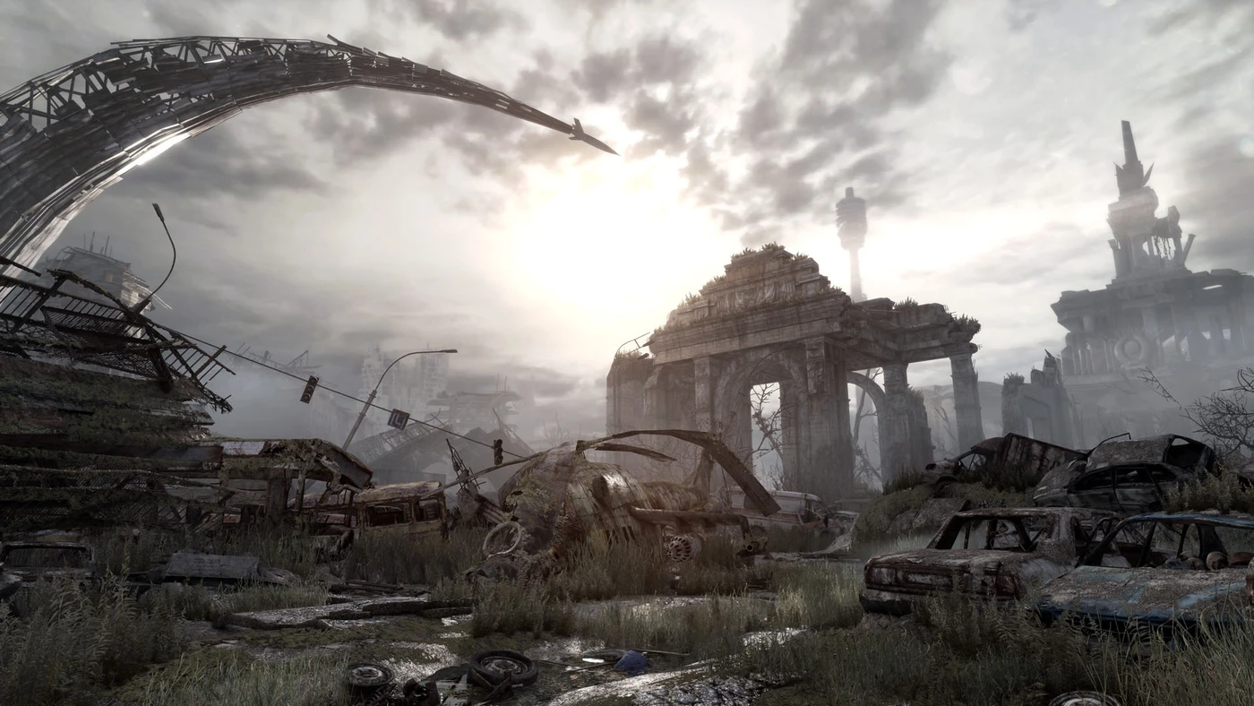 Ruined buildings, an arch and abandoned vehicles in an official Metro Redux screenshot